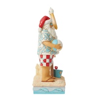 Jim Shore Heartwood Creek Coastal Christmas - Santa with Signs and Pelican